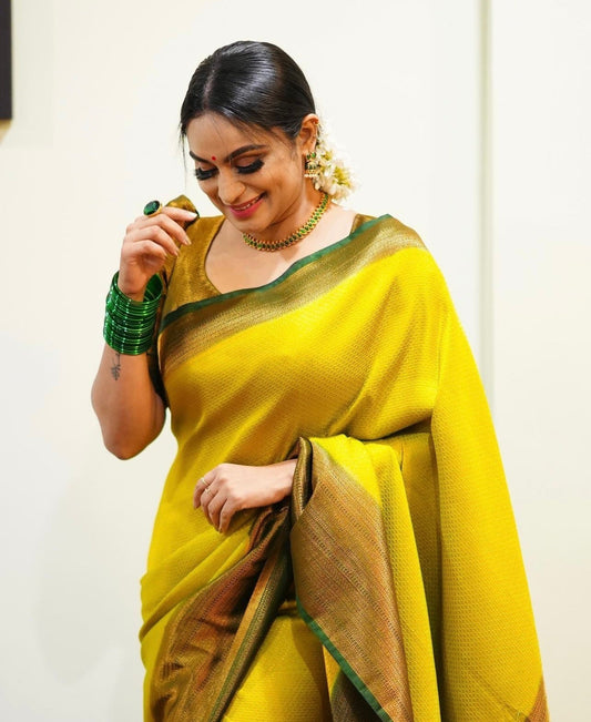 Appealing Yellow Soft Banarasi Silk Saree With Traditional Yellow Blouse Piece