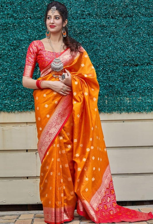 Women's Unique Orenge Patola Banarasi Silk Saree With Dazzling Multi Colour Blouse Piece