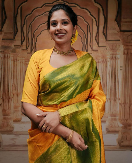 Artistic Yellow Banarasi Satin Silk Saree with Rich Wine Blouse Piece